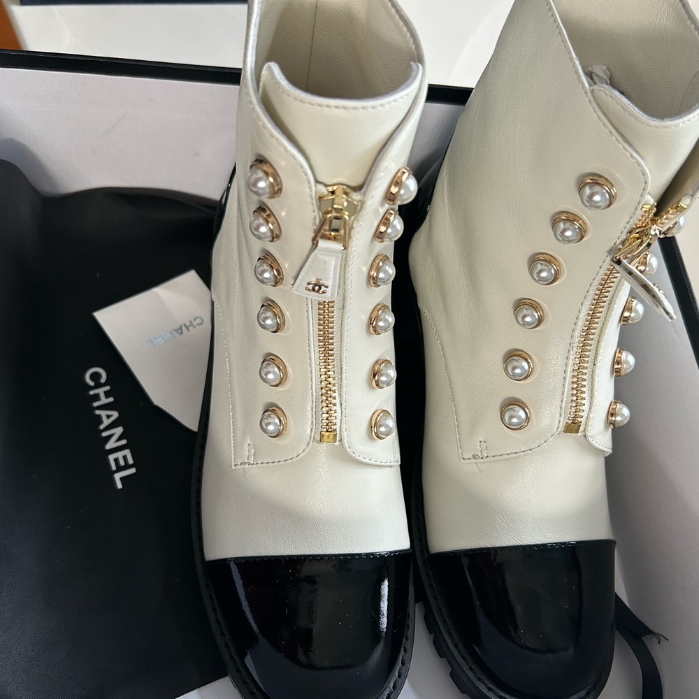 CC not authentic but cute pair of boots fits more like size 8 medium. Unworn